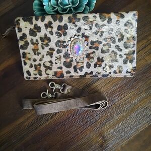 Elegant Leopard Print Wristlet with Jewel Accent